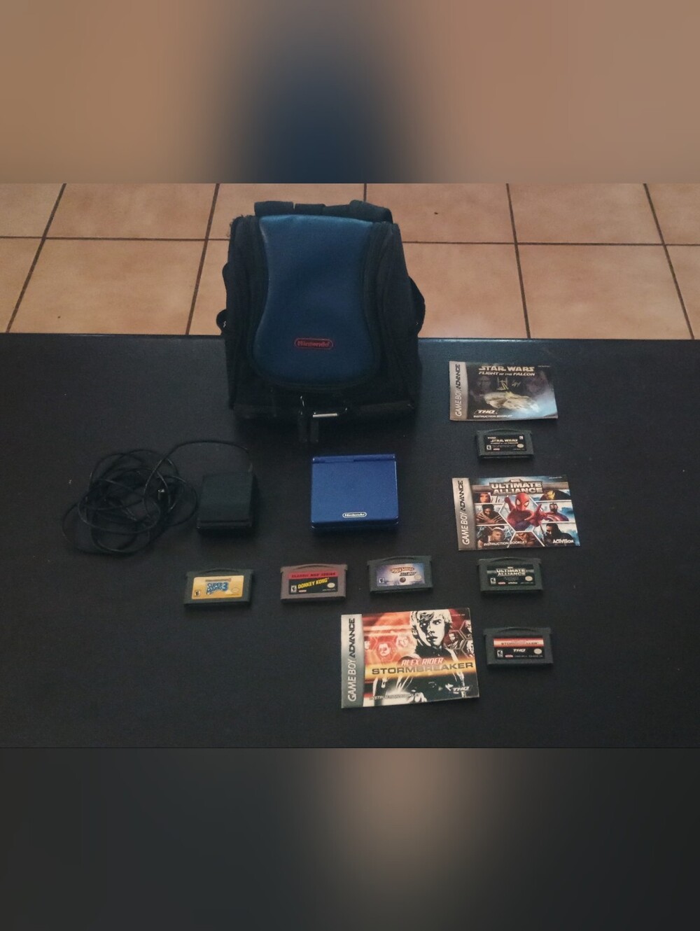 Nintendo Blue Game Boy Advance SP with 6 Games and Carry Case